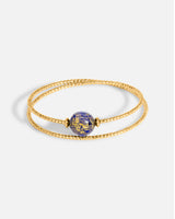 Liliflo_bijoux modulables swiss made_bracelet Milonga en double tour_couleur or jaune avec un Murano Aube de couleur bleu nuit avec feuille d’or
