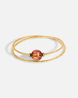 Liliflo_bijoux modulables swiss made_bracelet Milonga en double tour_couleur or jaune avec un Murano Crépuscule de couleur rouge avec feuille d’or