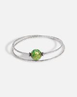 Liliflo_Schmuck modular swiss made_Doppelt gedrehtes Milonga Armband_Naturfarbe mit einem Murano Boreal in grün mit Blattgold