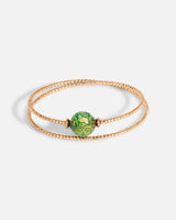 Liliflo_Schmuck modular swiss made_Doppelt gedrehtes Milonga Armband_Farbe rosa mit einem grünen Murano Boreal mit Blattgold