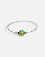 Liliflo_bijoux modulables swiss made_bracelet Milonga en simple tour_couleur naturel avec un Murano Boréale de couleur vert avec feuille d’or