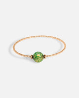 Liliflo_bijoux modulables swiss made_bracelet Milonga en simple tour_couleur rose avec un Murano Boréale de couleur vert avec feuille d’or