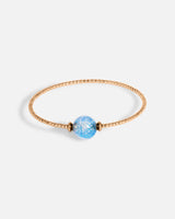 Liliflo_bijoux modulables swiss made_bracelet Milonga en simple tour_couleur rose avec un Murano Zenith de couleur bleu aqua avec feuille d’argent