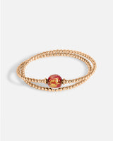 Liliflo_bijoux modulables swiss made_bracelet tango en double tour_couleur rose avec un Murano Crépuscule de couleur rouge avec feuille d’or