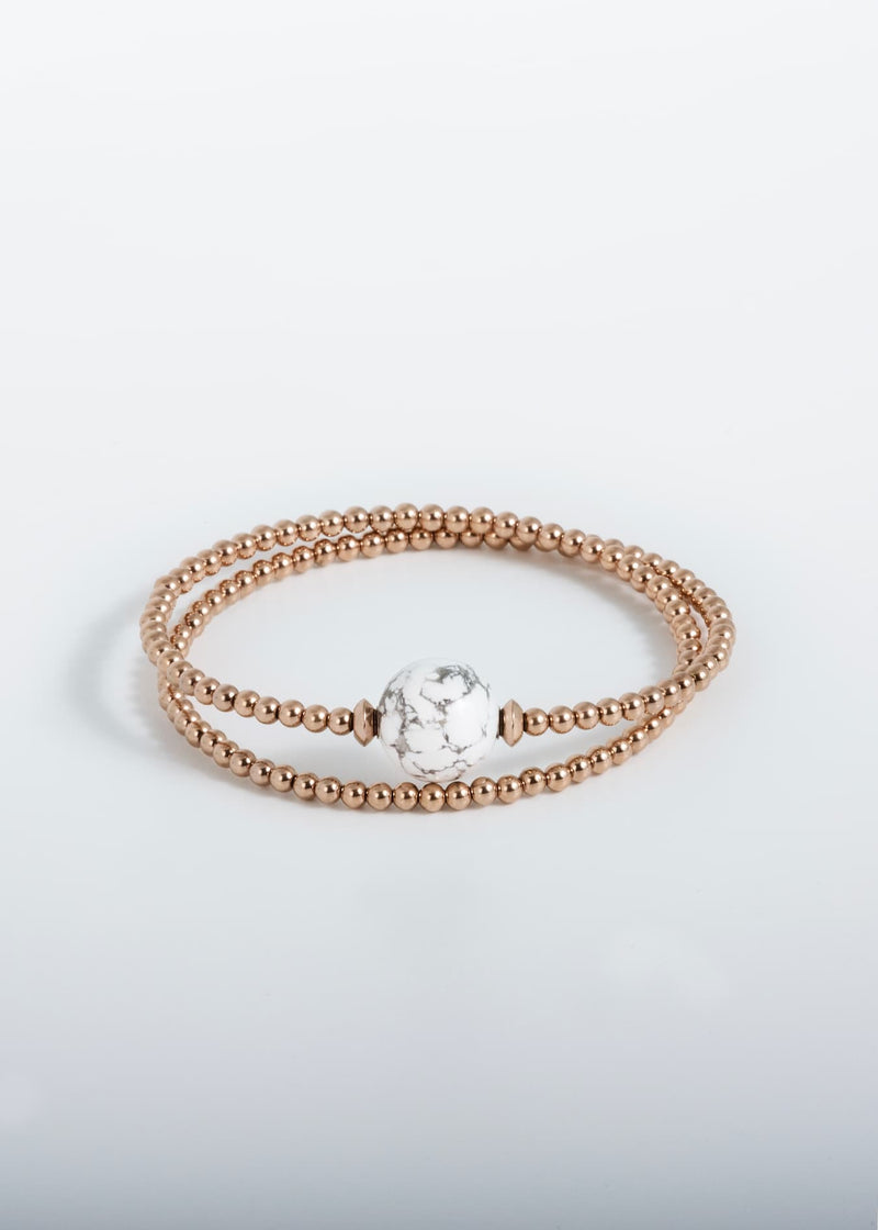 Liliflo, marque de bijoux Suisse : Bracelet Tango Double en couleur or rose - Pierre semi-précieuse Howlite