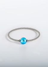 Liliflo, marque de bijoux interchangeable Suisse : Bracelet Tango simple tour en couleur naturel - Verre de Murano Aqua