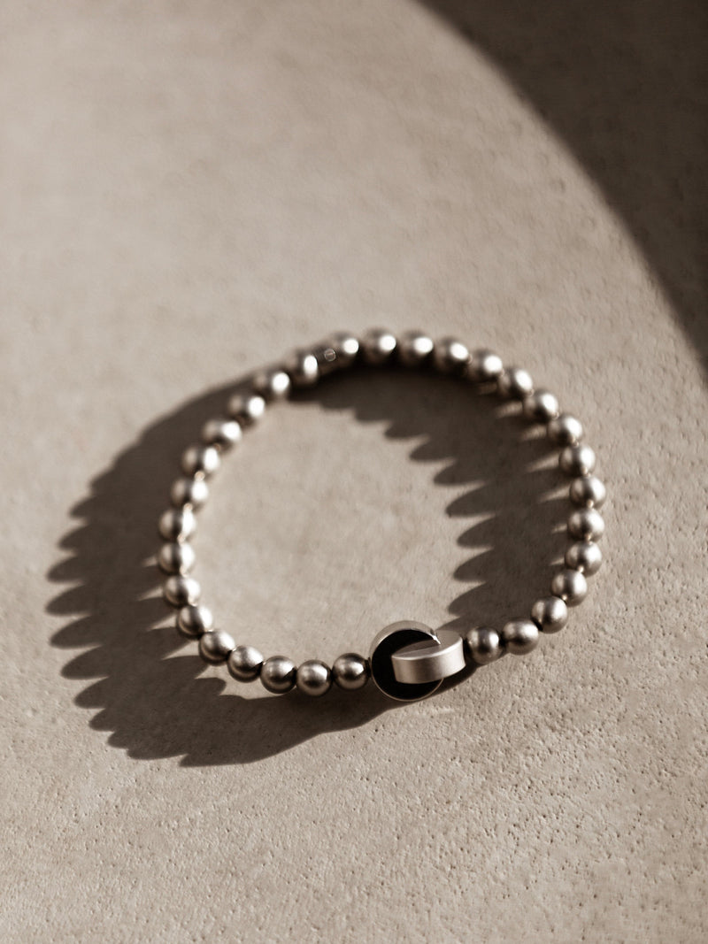 Fyve - marque de bijoux suisse - bracelet interchangeable pour homme - Lien Infinity avec le bracelet Beads
