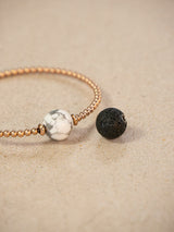 Coffret bracelet modulable Tango en couleur or rose avec des pierres semi-précieuses Howlite et Lave